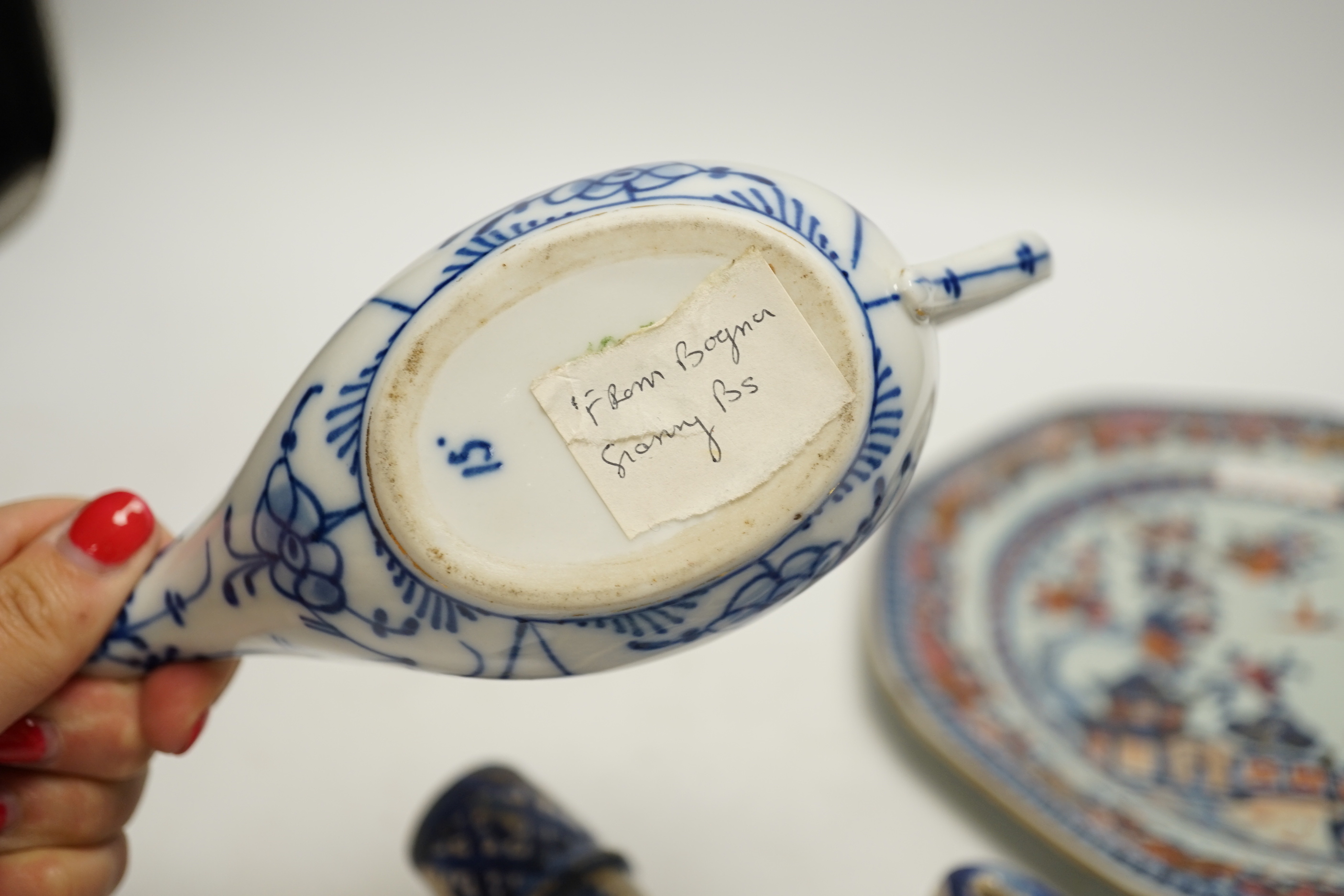 An 18th century Chinese export dish, a Iznik style flask and an onion pattern piece